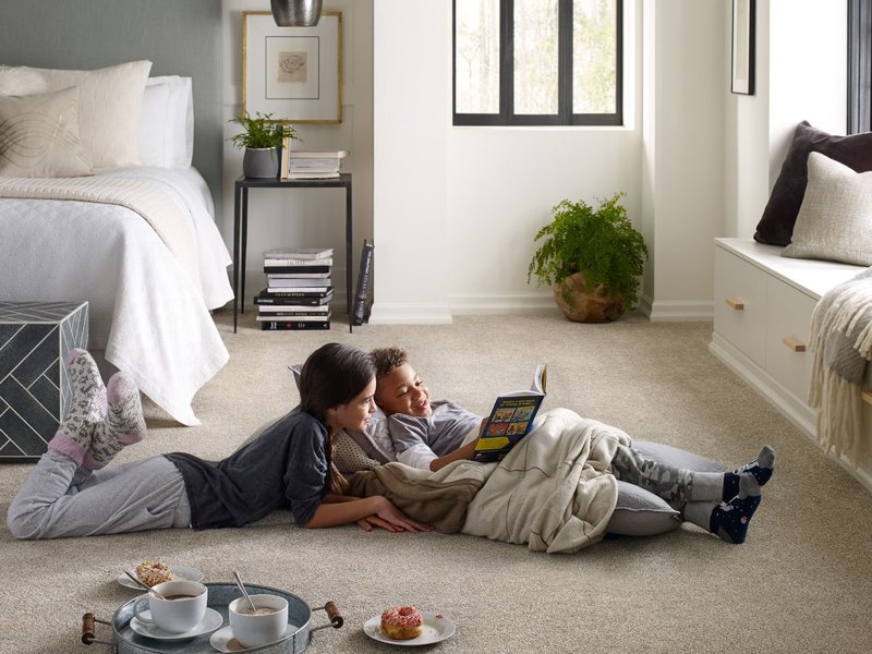 kids reading on bedroom floor from Life Style Floors in Chagrin Falls