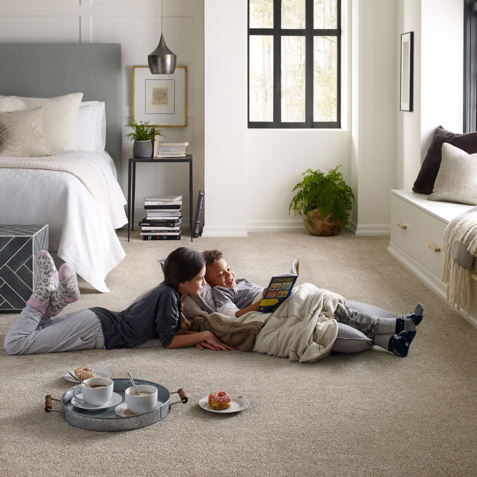 kids reading on bedroom floor from Life Style Floors in Chagrin Falls